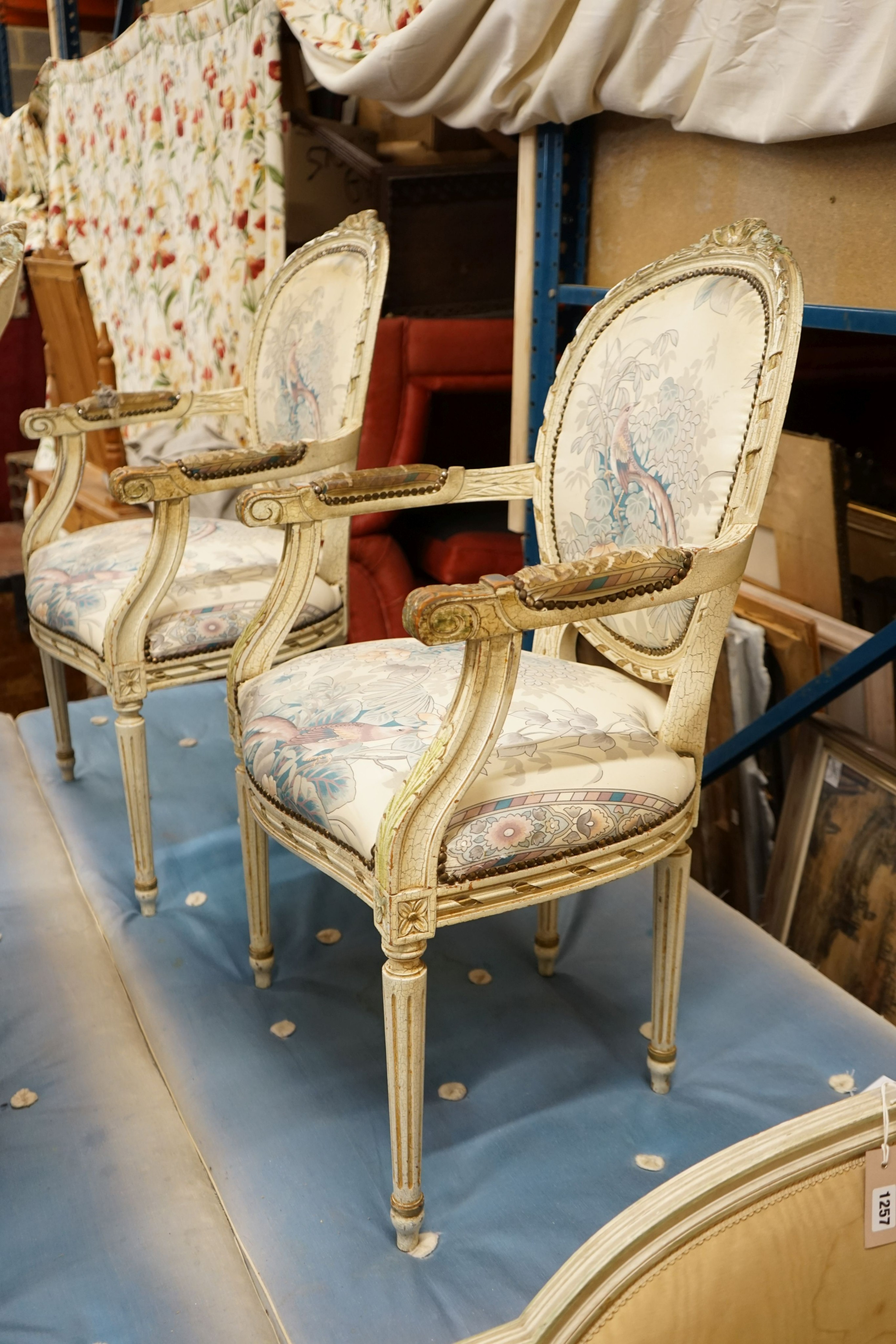 A set of four painted open armchairs, width 59cm, depth 50cm, height 95cm